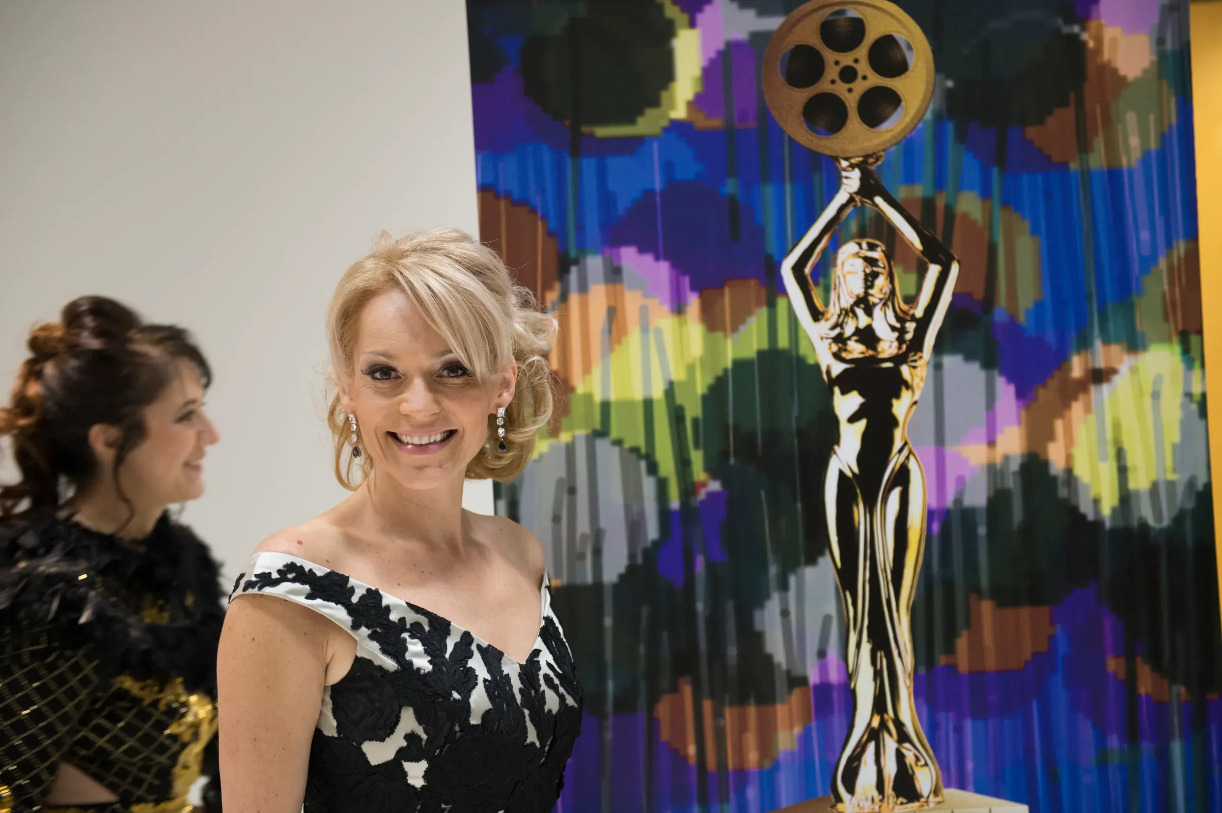 BBC presenter Kasia Madera beside the golden SIFFA award statuette